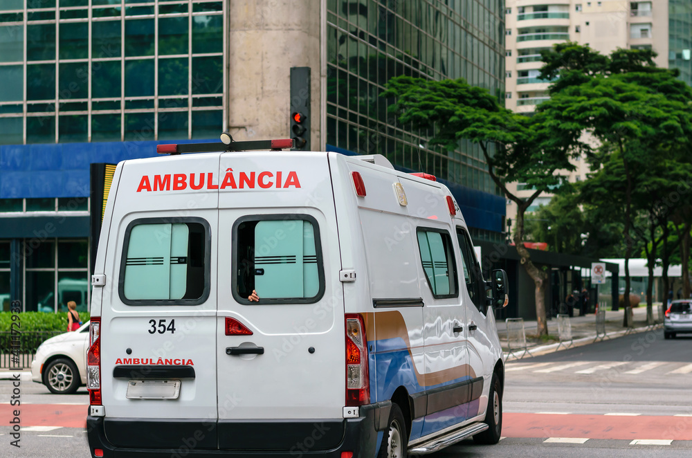 Fototapeta premium ambulance on the street of the city
