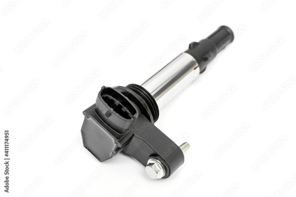 New ignition coil for gasoline engine car isolated on white background. Automotive spare parts. New ignition coil for gasoline engine car isolated on white background. Automotive spare parts.
