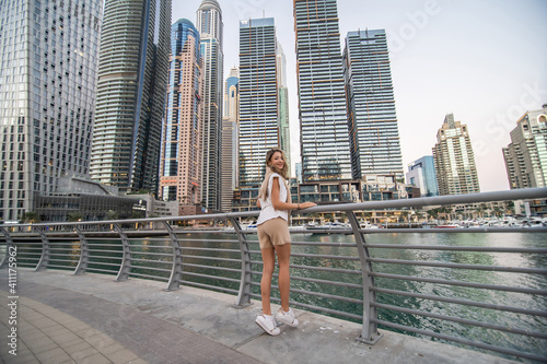 Portrait of a successful young woman smiling in an urban setting