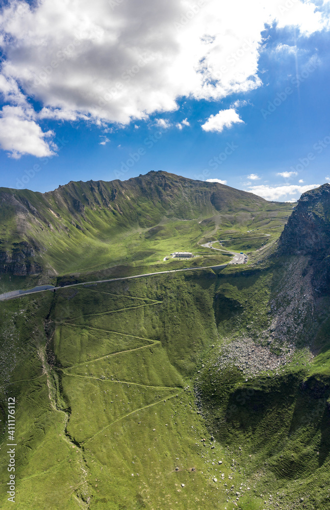 Fototapeta premium Aerial view of Grossglockner serpentine Taxenbacher Fusch high alpine road uphill in Austria