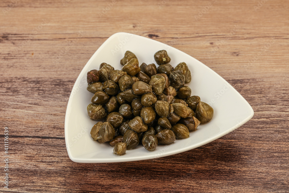 Tasty capers in the bowl Tasty capers in the bowl