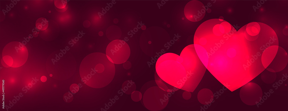 shiny two love hearts bokeh banner design