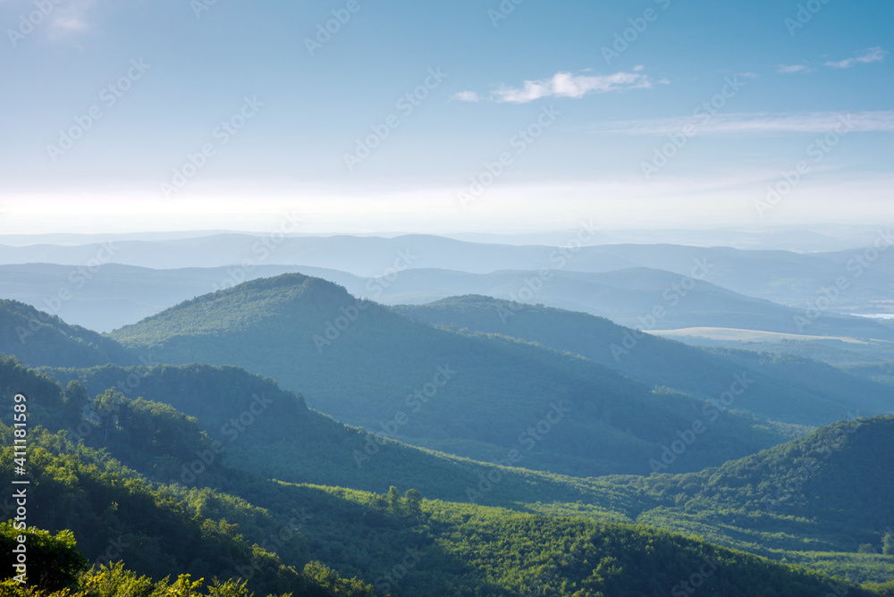 Obraz premium Green hills in mist