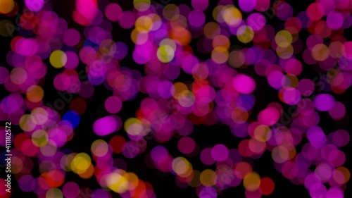 Abstract bokeh background animation, blurry colorful purple circles glittering on black, 4K interesting animation.
