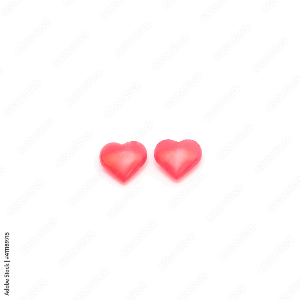 Two pink valentine day hearts isolated on white background.