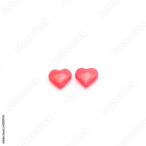 Two pink valentine day hearts isolated on white background.