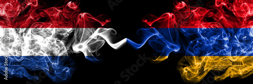 Netherlands vs Armenia, Armenian smoky mystic flags placed side by side. Thick colored silky abstract smoke flags.