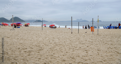  Citizens swim and sunbathe on the beach of Copacabana