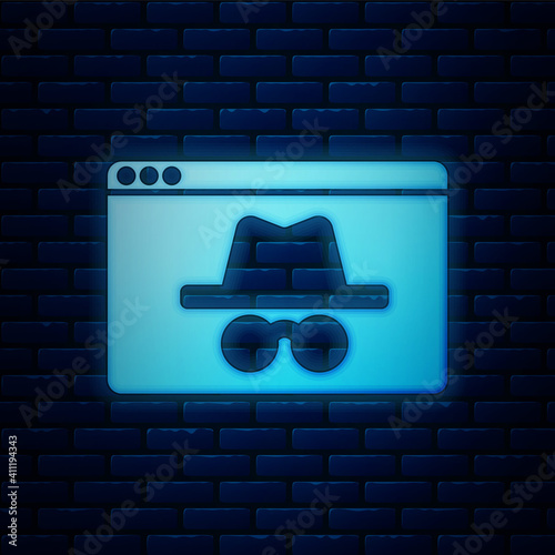Glowing neon Browser incognito window icon isolated on brick wall background. Vector.