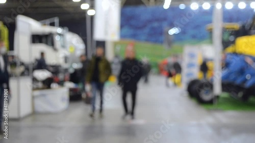 Wallpaper Mural Blurred background. People walk inside large space building. Exhibition presentation. Abstract background and bokeh spots with moving people indoors. Hall, lobby, entry. People walk inside space. Torontodigital.ca