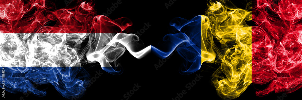 Obraz premium Netherlands vs Romania, Romanian smoky mystic flags placed side by side. Thick colored silky abstract smoke flags.