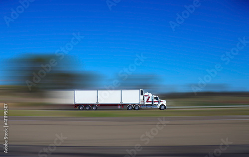 Photography Truck on Sydney freeway travelling fast towards Melbourne from Sydney with backg