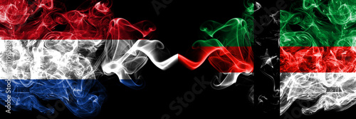 Netherlands vs United States of America, America, US, USA, American, Denison, Texas smoky mystic flags placed side by side. Thick colored silky abstract smoke flags. photo