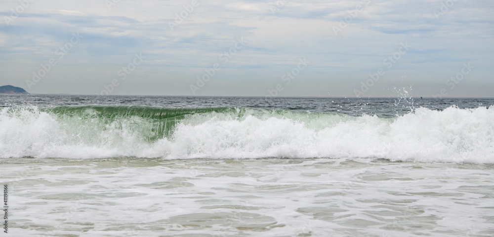 Ocean surf on the beach of Copacabana. Rio de Janeiro, February 2020ю