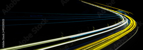 abstract blue and yellow car lights at night