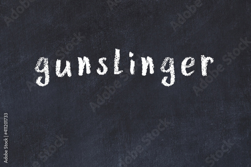 Canvas Print College chalk desk with the word gunslinger written on in