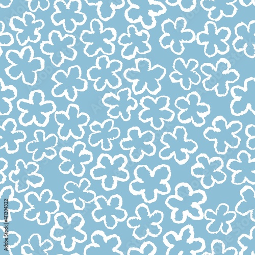 Pattern for children's clothing . Vector blue background with white daisies.