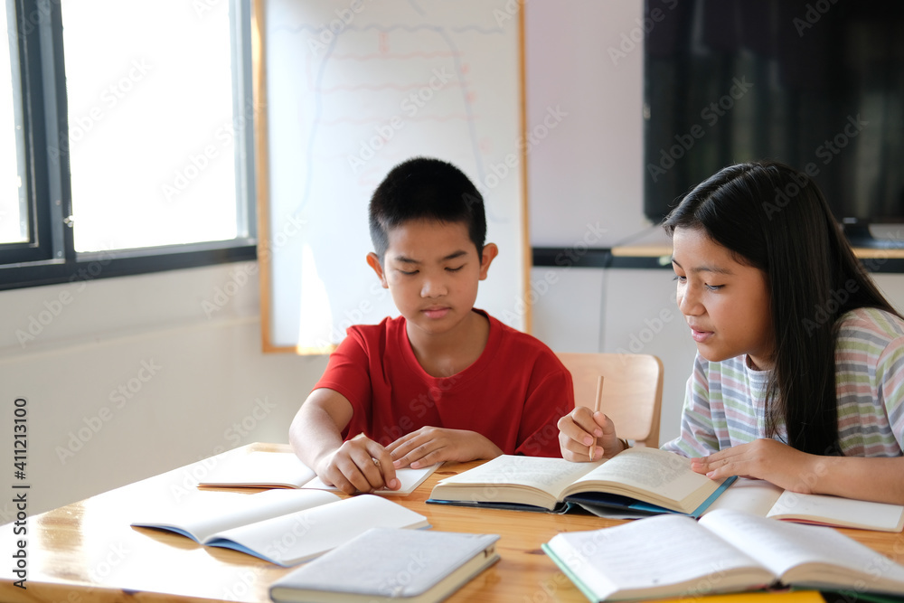 boy girl student studying doing homework. learning education at school boy girl student studying doing homework. learning education at school