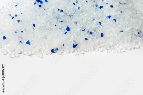 Cat litter based on silica gel on white background