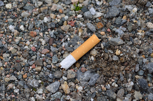 stop smoking, sigarette on ground