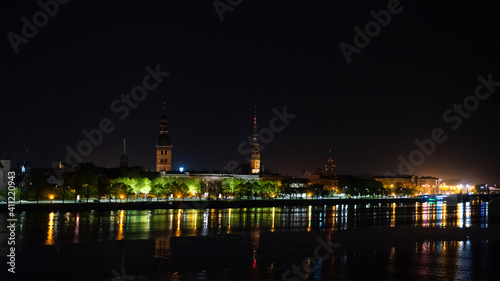 Riga city panoramic view across Daugava river at night