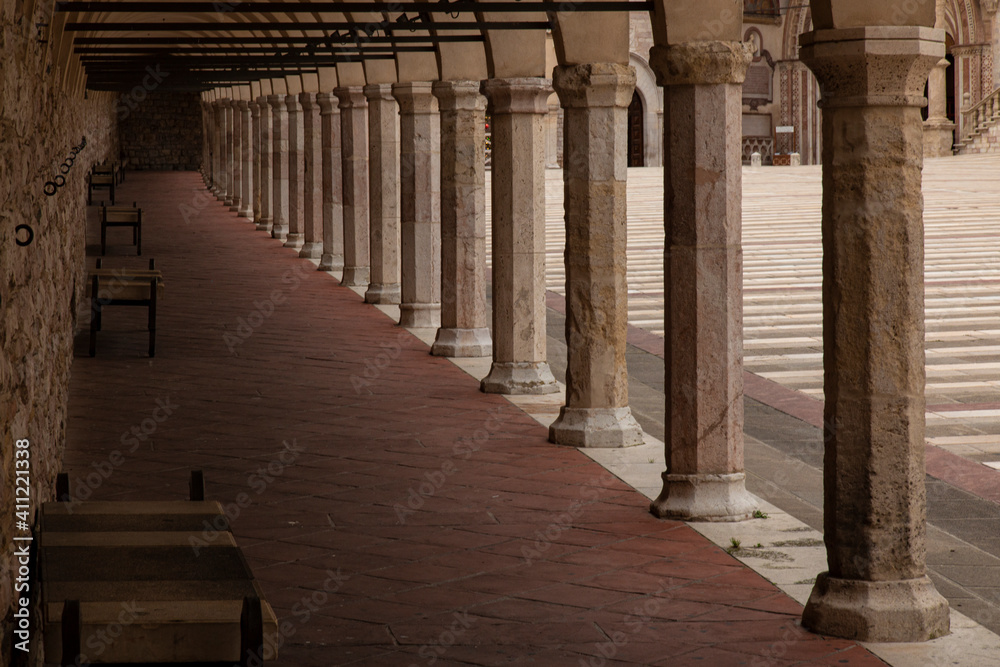 the colonnade of the basilica of San Francesco in Assisi 