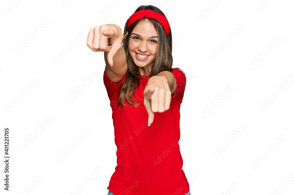 Young brunette woman wearing casual clothes pointing to you and the camera with fingers, smiling positive and cheerful Young brunette woman wearing casual clothes pointing to you and the camera with fingers, smiling positive and cheerful