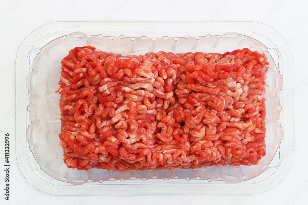 Fresh mince meat in transparent plastic box on white background
Fresh mince meat in transparent plastic box on white background