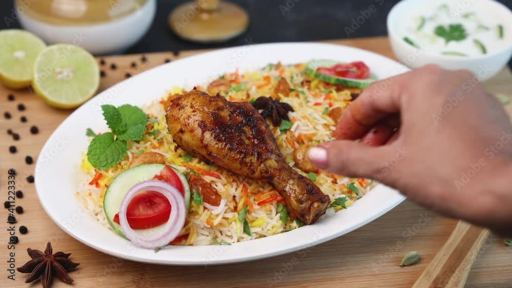 Chicken biryani Spicy Indian Malabar biryani Hyderabadi biryani, Dum Biriyani pulao 4K slow motion video footage Kerala India Sri Lanka basmati rice mixed rice dish with meat curry Ramadan Kareem, Eid Chicken biryani Spicy Indian Malabar biryani Hyderabadi biryani, Dum Biriyani pulao 4K slow motion video footage Kerala India Sri Lanka basmati rice mixed rice dish with meat curry Ramadan Kareem, Eid