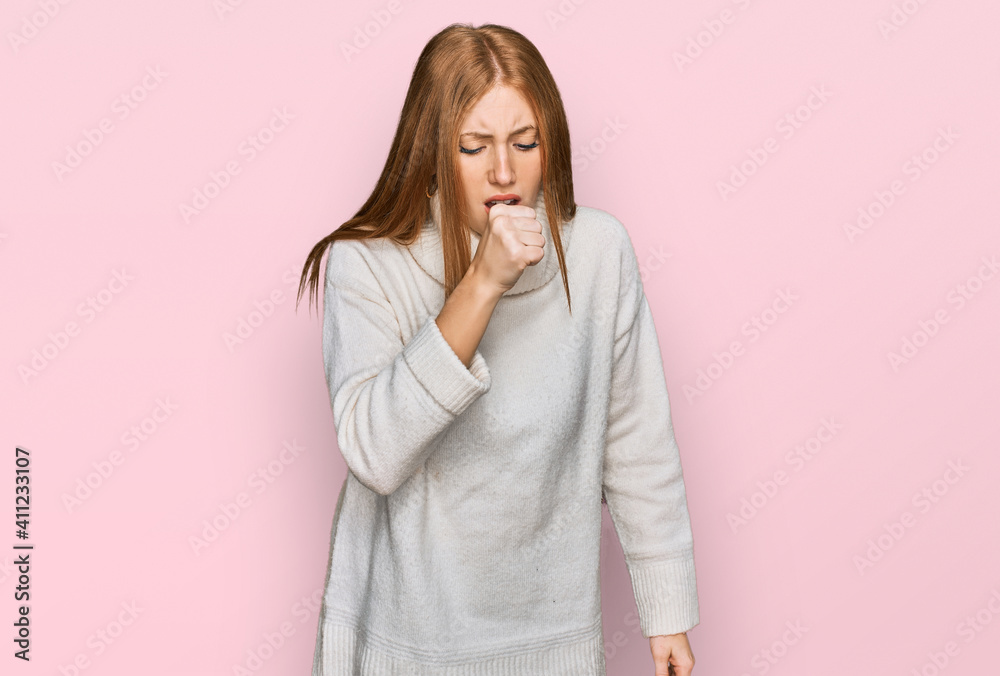 Young irish woman wearing casual winter sweater feeling unwell and coughing as symptom for cold or bronchitis. health care concept. Young irish woman wearing casual winter sweater feeling unwell and coughing as symptom for cold or bronchitis. health care concept.