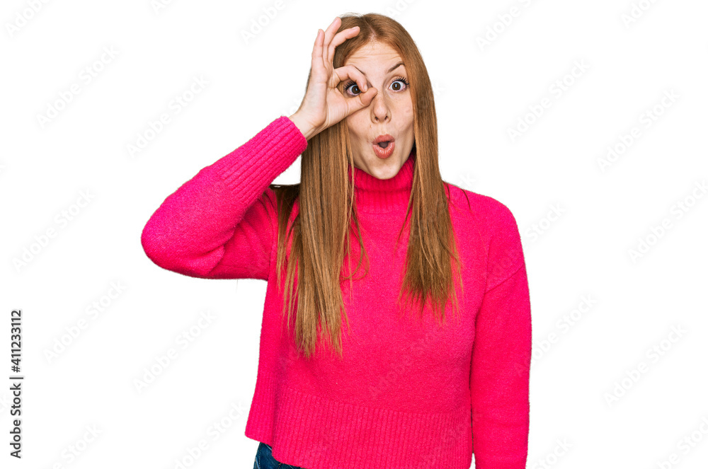 Young irish woman wearing casual clothes doing ok gesture shocked with surprised face, eye looking through fingers. unbelieving expression. Young irish woman wearing casual clothes doing ok gesture shocked with surprised face, eye looking through fingers. unbelieving expression.