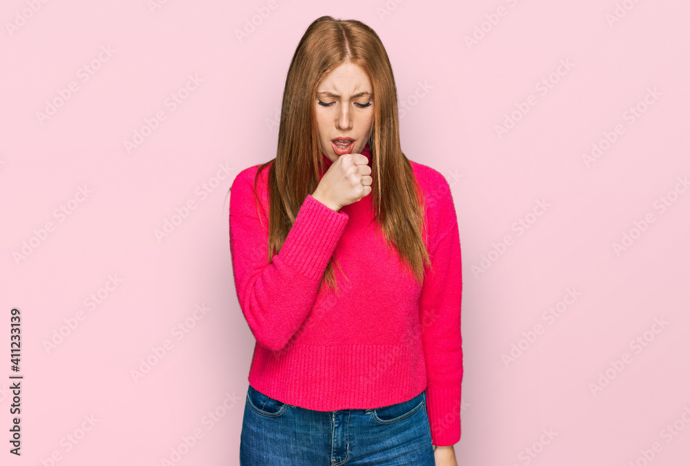 Young irish woman wearing casual clothes feeling unwell and coughing as symptom for cold or bronchitis. health care concept. Young irish woman wearing casual clothes feeling unwell and coughing as symptom for cold or bronchitis. health care concept.