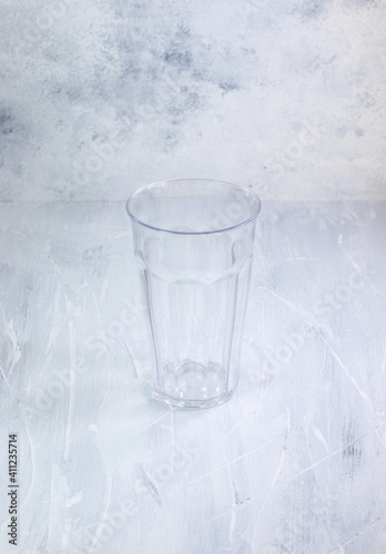 Glass cup with a whiter ustic background