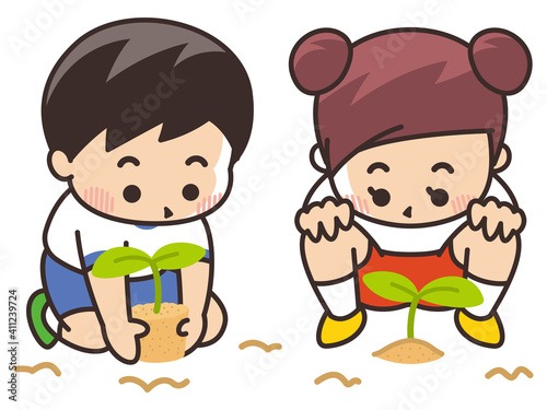 苗を植える子供