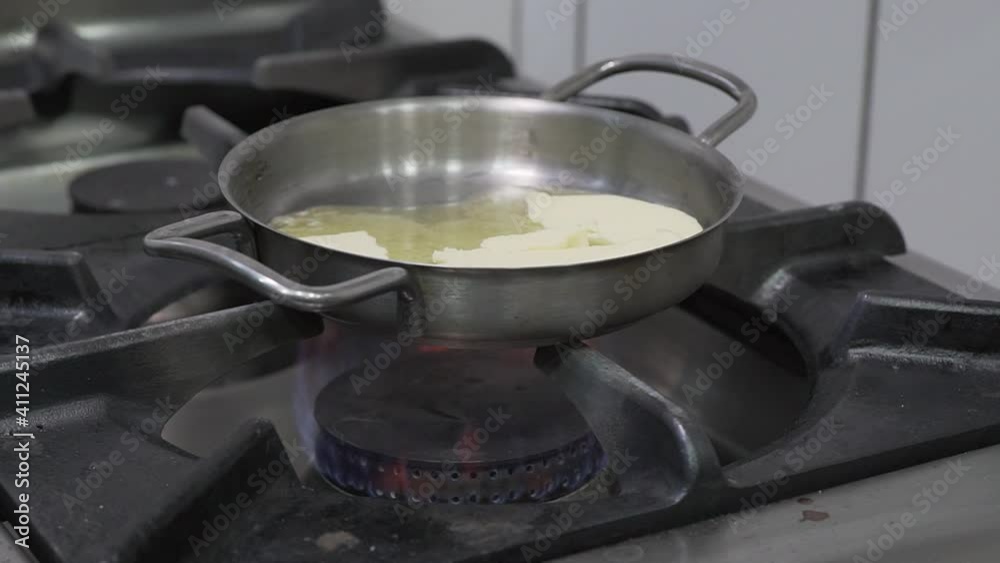 Butter is melting in the pan Butter is melting in the pan