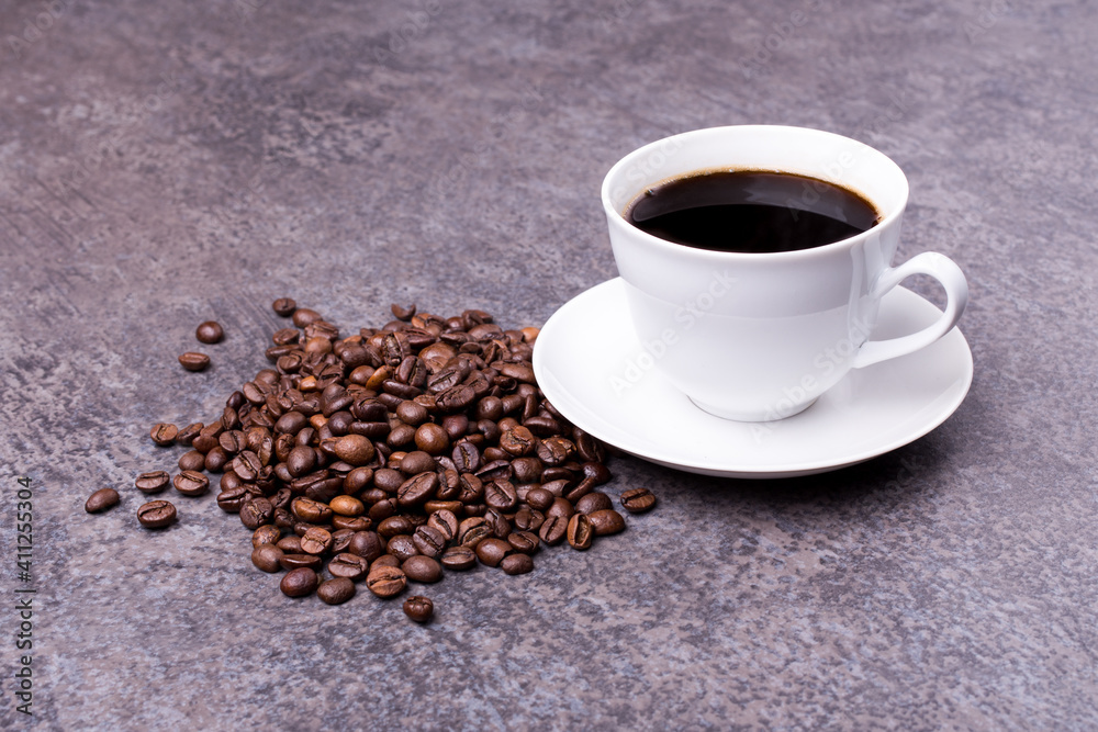 white porcelain cup with saucer full of hot coffee, with coffee beans beside white porcelain cup with saucer full of hot coffee, with coffee beans beside