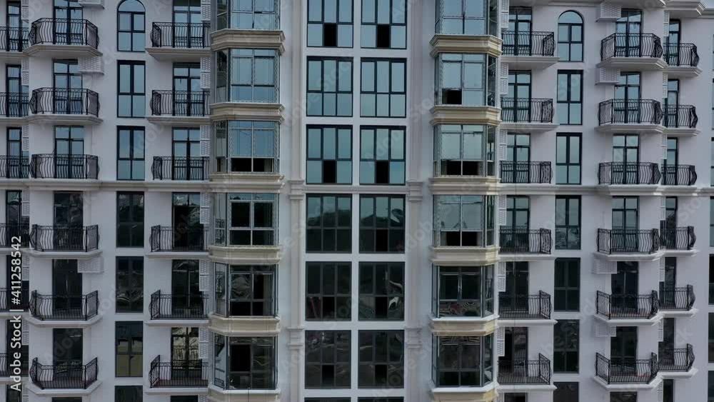 Aerial Shot Approaching The Facade Of A Very Tall Housing Apartment. Sochi, Russia Aerial Shot Approaching The Facade Of A Very Tall Housing Apartment. Sochi, Russia