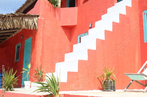 red house in the village