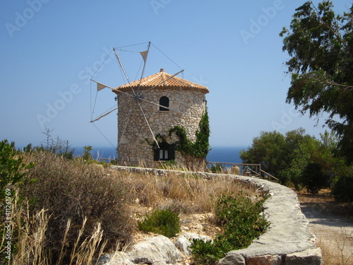 Traditional greek old windmill on Skinari Cape at Zakynthos island, Greece