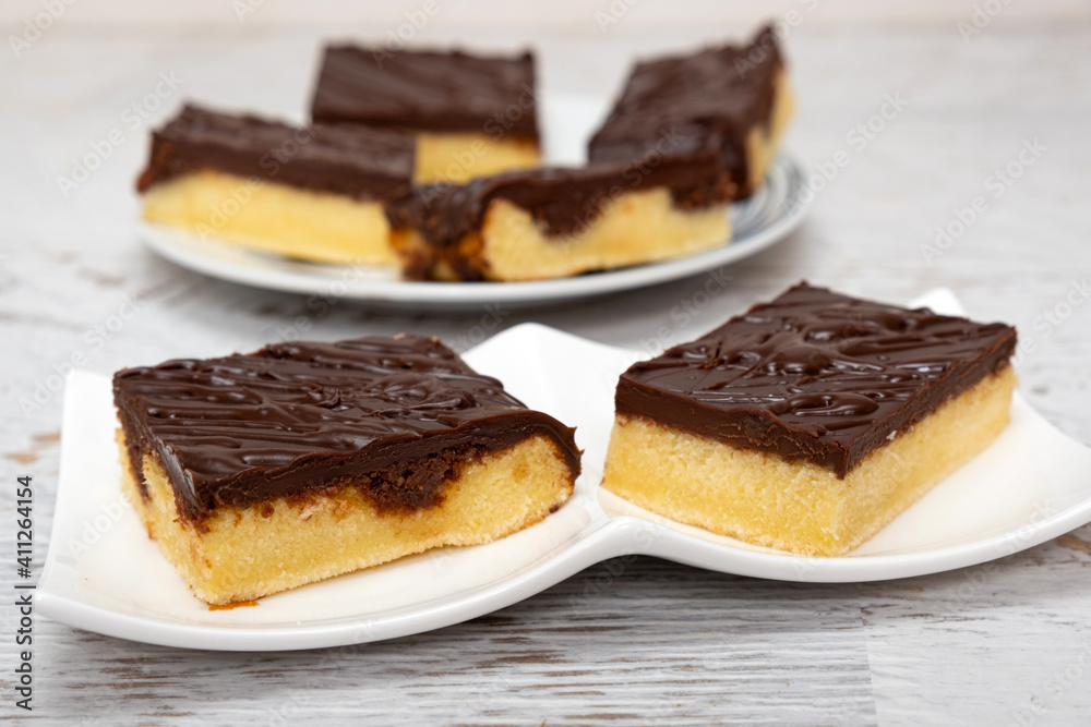 Chocolate vanilla loaf marble cake with chocolate glazing