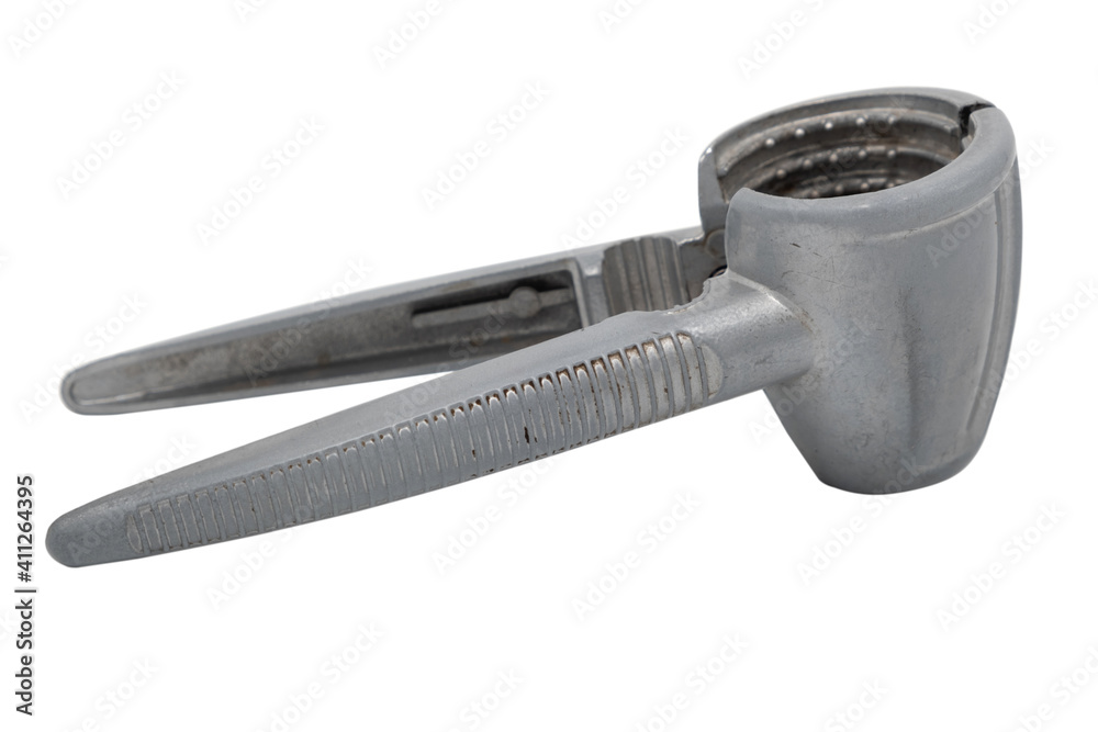 Old and used nutcracker on white background