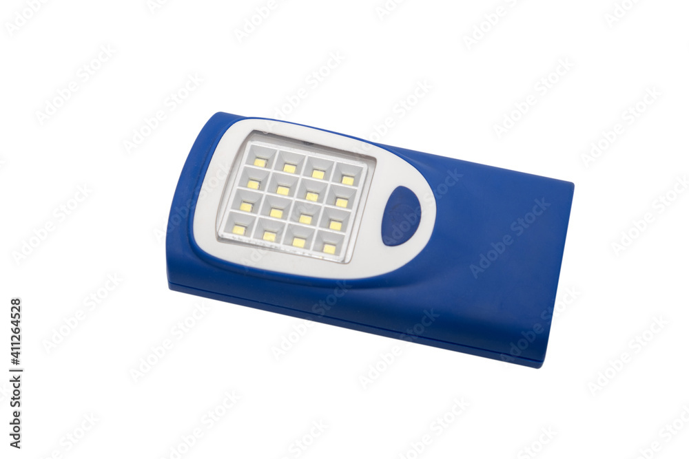 Small used LED flashlight isolated on white background