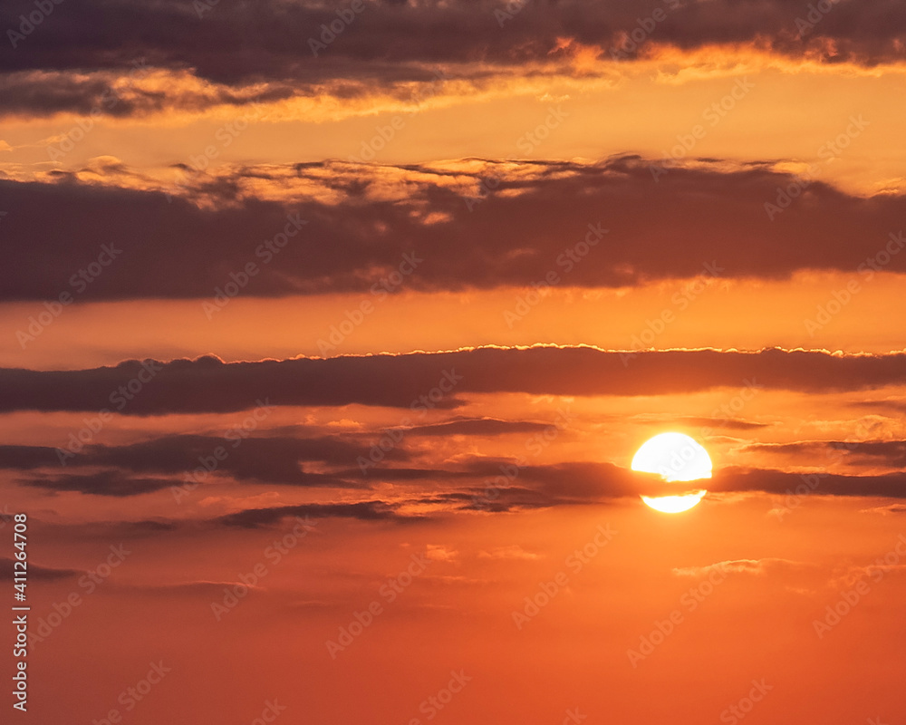 orange fiery sky and some clouds, nature background