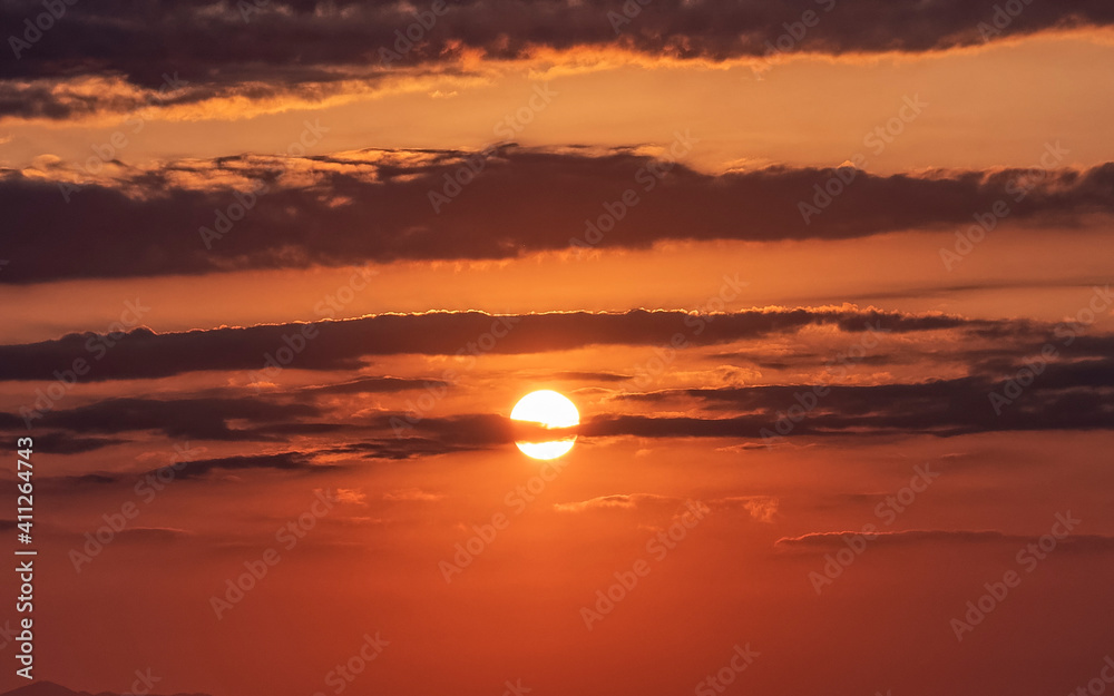 orange fiery sky and some clouds, nature background
