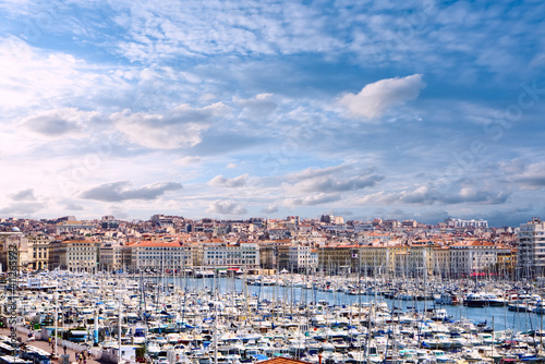 Cloudy sky above Marseille harbor photo