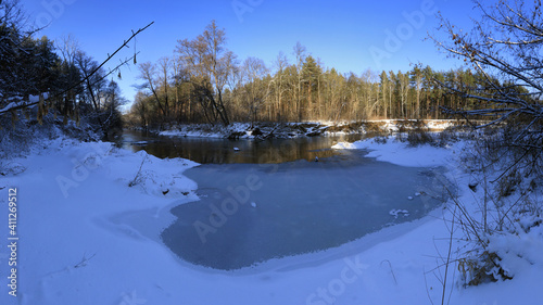 Nature reserve of the Swider river in winter, Mazowsze, Poland photo