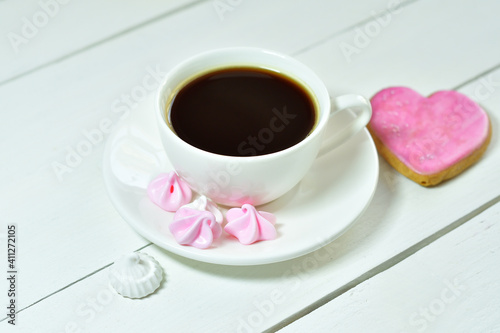 cup of coffee and gingerbread in the form of hearts. Breakfast on Valentine's Day or 8 March.