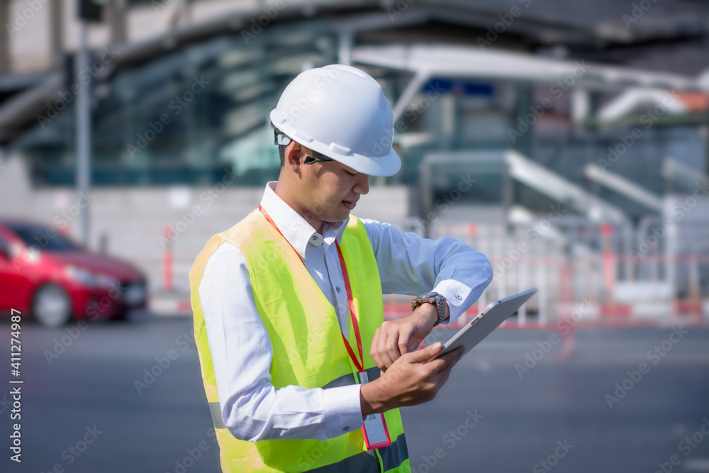 Portrait asian manager engineer,at work on outside,survey 5G signal network system,using digital tablet online control outdoor site,concept action business working industry telecommunication Portrait asian manager engineer,at work on outside,survey 5G signal network system,using digital tablet online control outdoor site,concept action business working industry telecommunication