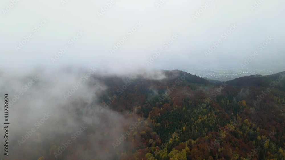 view of the mountains through the clouds view of the mountains through the clouds