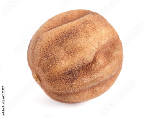 Sun Dried Lime. Dry Lemon (Limu Omani) Isolated on White Background. Also known as Black Lime, Noomi Basra, Limoo Amani and Loomi.